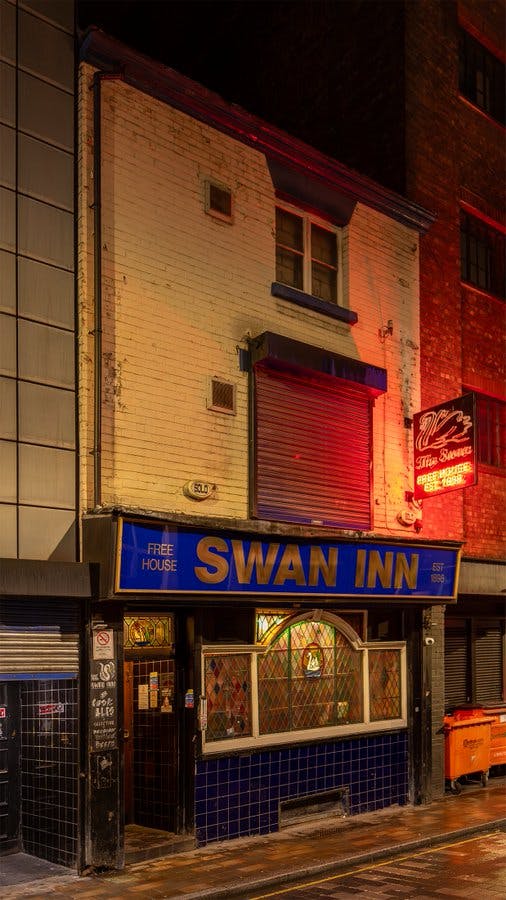 <p>The Swan on Wood Street is a historic pub located in the heart of the City of London. Here's an extensive overview:</p><p><br></p><p><strong>History:</strong></p><p><br></p><p>The Swan has a rich history dating back several centuries. It's believed to have been established in the early 17th century, making it one of the oldest pubs in London.</p><p><br></p><p>Originally known as "The Sign of the Swan", it has survived through numerous historical events, including the Great Fire of London in 1666 and World War II bombings.</p><p><br></p><p>The pub has likely served as a meeting place for locals, traders, and travelers throughout its long history, contributing to its status as a cultural landmark in the area.</p><p><br></p><p><strong>Architecture and Ambiance:</strong></p><p><br></p><p>The building's architecture reflects its historical significance, with traditional features such as wooden beams, cozy fireplaces, and period furnishings.</p><p><br></p><p>The ambiance of The Swan is typically warm and welcoming, offering patrons a glimpse into London's past while enjoying a pint of ale or a hearty meal.</p><p><br></p><p>The interior decor may feature historical memorabilia, vintage signage, and photographs showcasing the pub's evolution over the centuries.</p><p><br></p><p><strong>Location:</strong></p><p><br></p><p>The Swan is situated on Wood Street, within close proximity to notable landmarks such as St. Paul's Cathedral, the Guildhall, and the Barbican Centre.</p><p><br></p><p>Its central location makes it a convenient stop for locals, workers, and tourists exploring the City of London.</p><p><br></p><p><strong>Food and Drink:</strong></p><p><br></p><p>As a traditional British pub, The Swan likely offers a selection of classic pub fare, including fish and chips, pies, burgers, and Sunday roasts.</p><p><br></p><p>The pub may also feature a variety of beers, ales, ciders, and spirits, catering to different tastes and preferences.</p><p><br></p><p>Some historic pubs like The Swan may also specialize in serving traditional British ales or craft beers, showcasing local breweries and unique flavors.</p><p><br></p><p><strong>Cultural Significance:</strong></p><p><br></p><p>Beyond its role as a watering hole, The Swan likely holds cultural significance as a community gathering place, where locals and visitors alike come together to socialize, relax, and share stories.</p><p><br></p><p>It may have been frequented by notable figures throughout history, adding to its allure and charm.</p><p><br></p><p>The pub's preservation and continued operation contribute to the conservation of London's architectural heritage and social traditions.</p><p><br></p><p><strong>Events and Entertainment:</strong></p><p><br></p><p>Like many traditional pubs, The Swan may host a variety of events and entertainment throughout the year, such as live music performances, pub quizzes, and themed nights.</p><p><br></p><p>These events serve to enhance the pub experience and attract a diverse clientele, fostering a sense of community and camaraderie among patrons.</p><p><br></p><p><strong>Conclusion:</strong></p><p><br></p><p>The Swan on Wood Street stands as a testament to London's rich history and cultural heritage. As one of the oldest pubs in the city, it continues to serve as a cherished gathering place where locals and visitors can appreciate the past while enjoying good food, drinks, and company. Whether you're seeking a taste of traditional British pub culture or simply looking for a cozy spot to unwind, The Swan offers a quintessential London pub experience.</p>